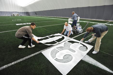 Field Painting a practice field in the U of I dome for the Big Game on 2-5-12.