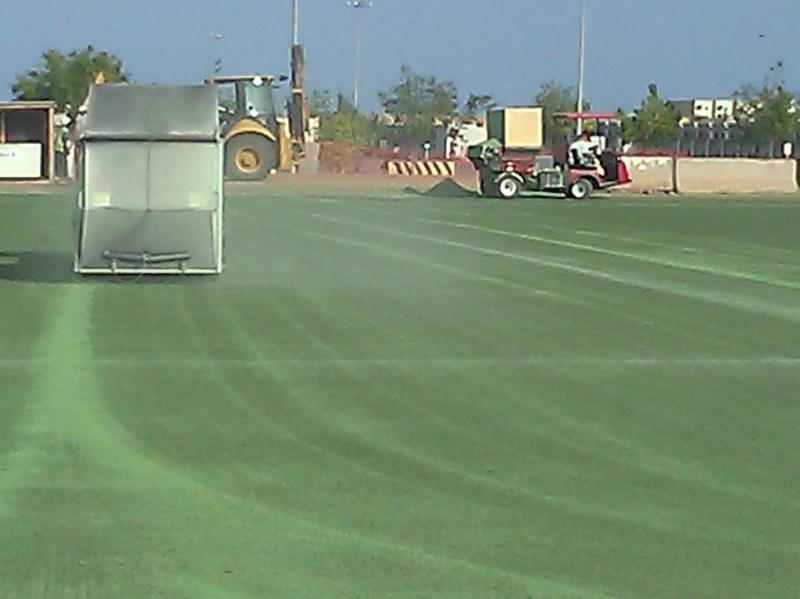 Preparing turf at Camp Lemonier Djibouti, Africa for replacement infill.
